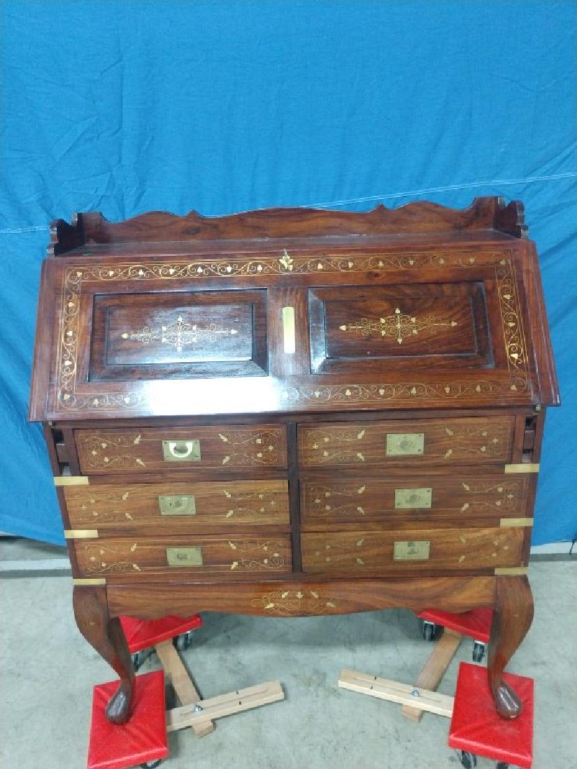Furniture - Rosewood Writing Desk: Desk with brass inlay. Has 6 drawers with flush mount D ring pulls, brass caring handles on sides. Pull out boards for top to rest on Under lid there are 2 drawers and columns. Has key. Minor signs of
