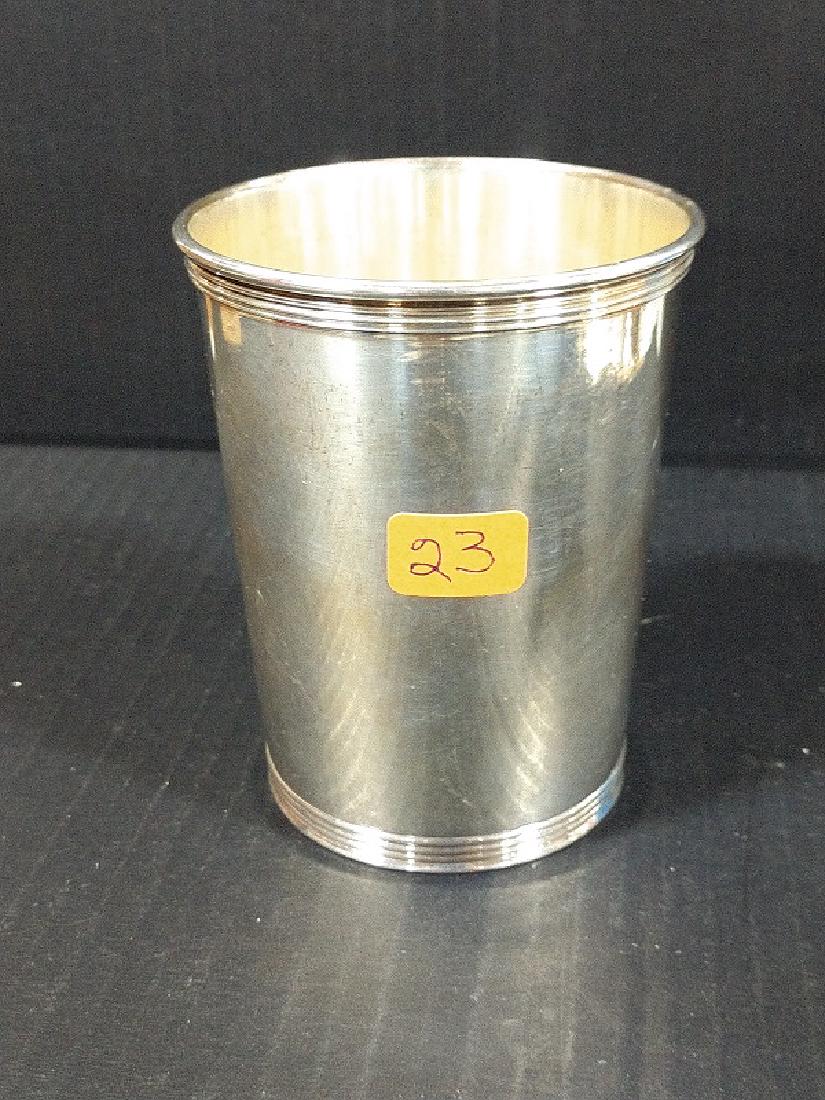 Sterling Silver - Mint Julep Cup: Sterling 2759S, engraved on bottom Mamaw 12-25-48 ; Dent on bottom rim. Cup design includes 4 Ribs at top and bottom rims. 3 3/4"H x 2 15/16"W x 2 3/8"base; Approximate Weight 4.24 troy ounce