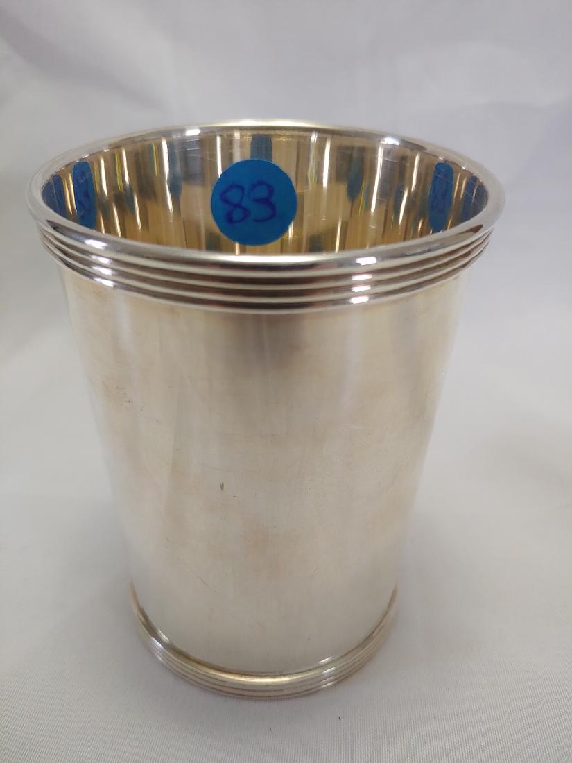 Sterling Silver - Mint Julep Cup: International Sterling, Engraved on side BRO Christmas 1968 . 4 Ribs at top and bottom rims. Approximate Weight 121.3 grams