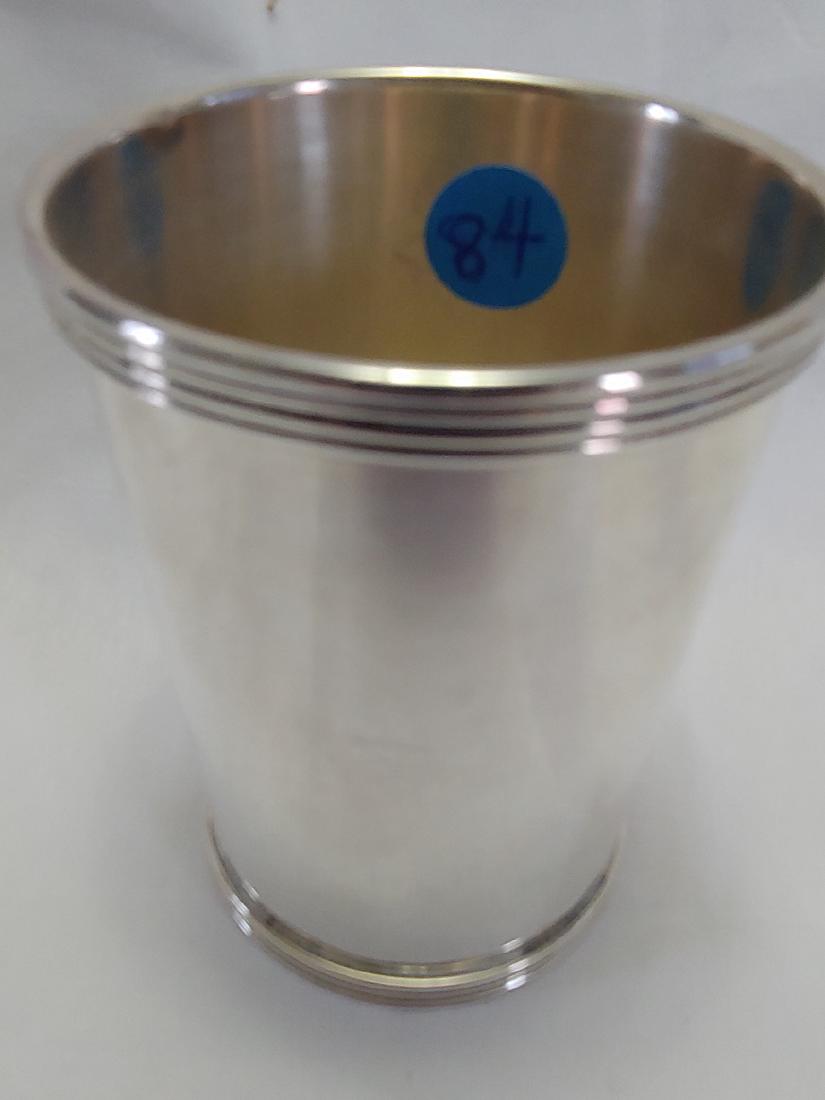 Sterling Silver - Mint Julep Cup: International Sterling, Engraved on side Oldham County Horse Show 1959 . 4 Ribs around the top and bottom. Approximate Weight 125.9 grams.