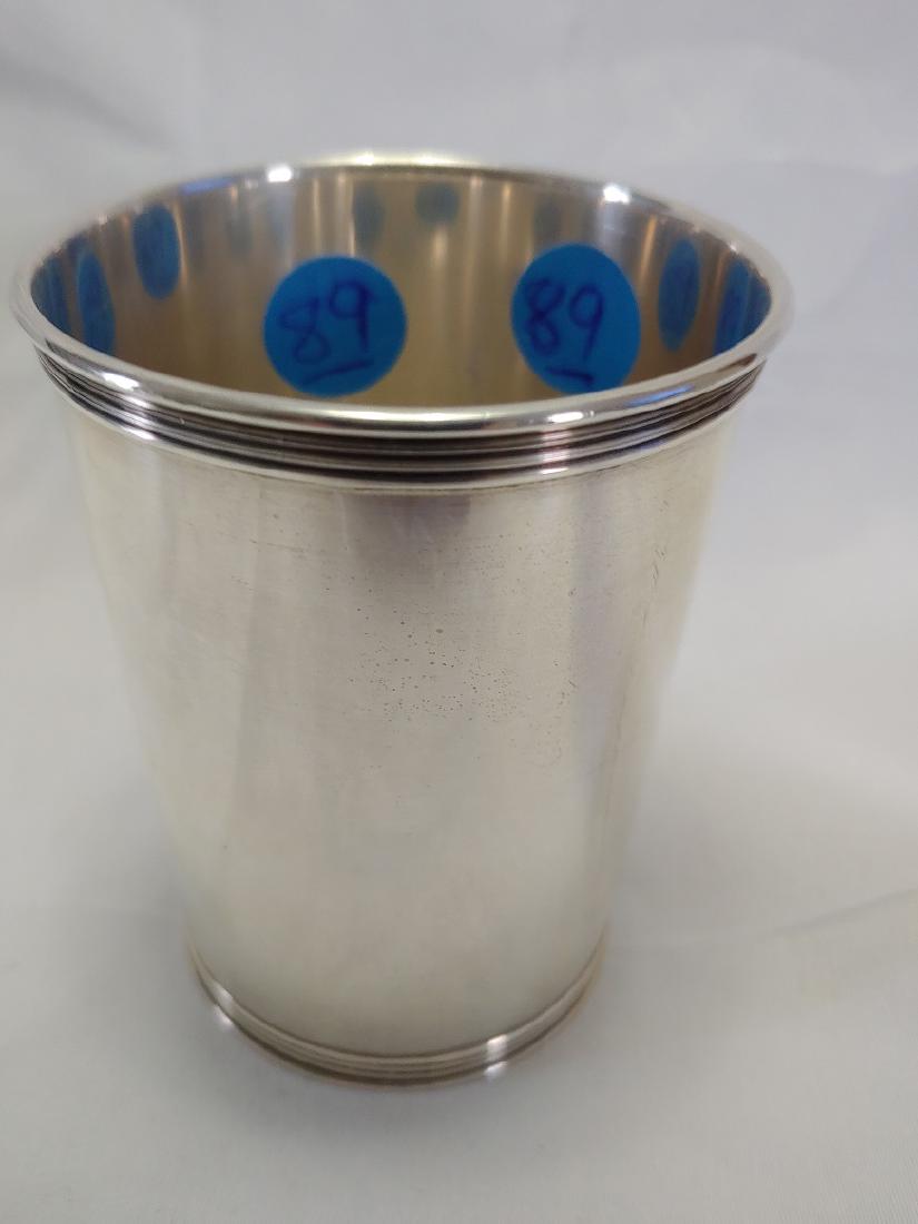 Sterling Silver - Mint Julep Cup: Stamped on bottom Sarah 1949 . 4 Ribs top and bottom. Approximate Weight 121.3 grams.
