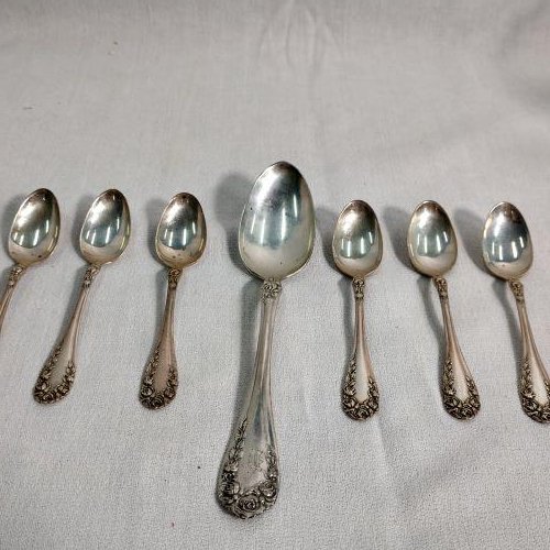 Sterling Silver - Spoons (7): Sterling Silver Spoons (6) possibly child's spoons. Pat. 1888. (1) Teaspoon, "M" engraved on handle. Meirian engarved on back handle of small spoons. Rose design on handles. Approx. Troy Oz