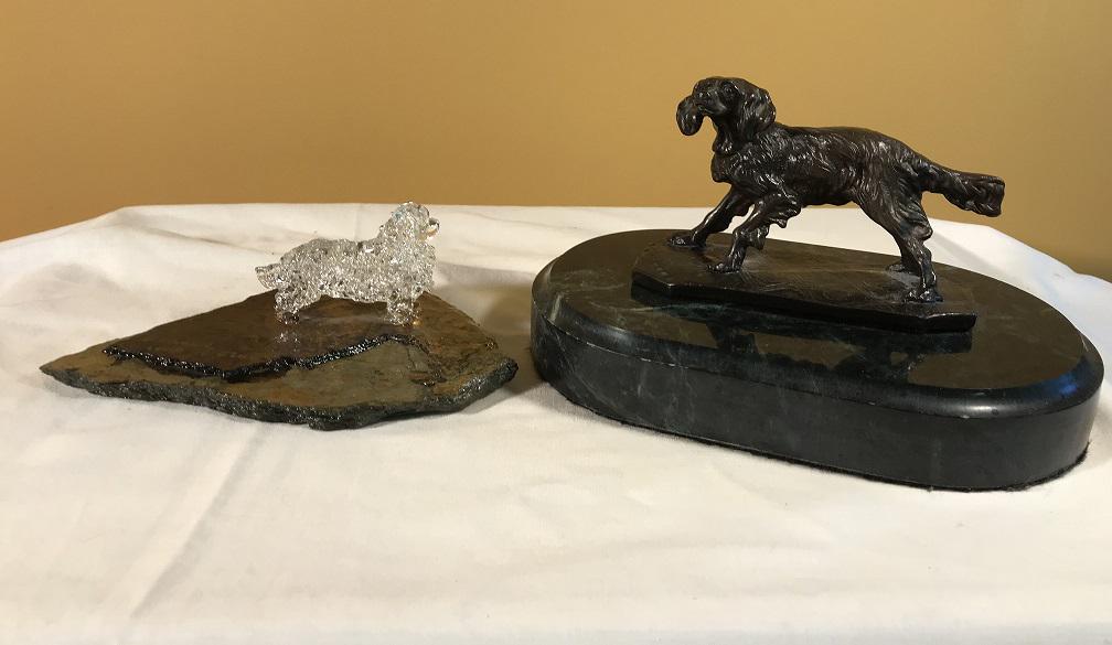Figurines - Glass on Bronze King Charles Cavalier: (2) King Charles Cavalier Spaniels with slate bottoms. Heavy lacquered. Bronze Base, Marble with Dog on top.