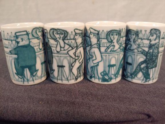 Porcelain - Shot Glasses (4): Bar and Patron Scene Shot Glasses. White porcelain w/green scene. Each glass has 3 patrons & 2 bartenders and a dog. Made in Western Germany