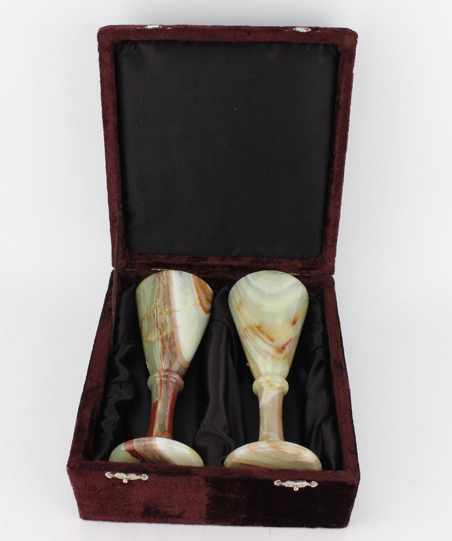 A PAIR OF ONYX HIGH-FOOT CUPS (1 of 7)