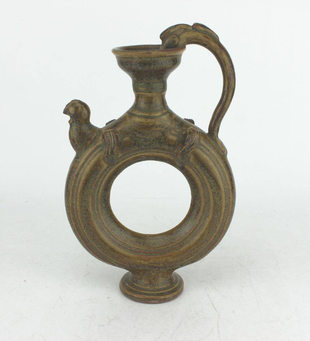 A CHINESE CELADON DONUT STYLE TEA POT (1 of 10)