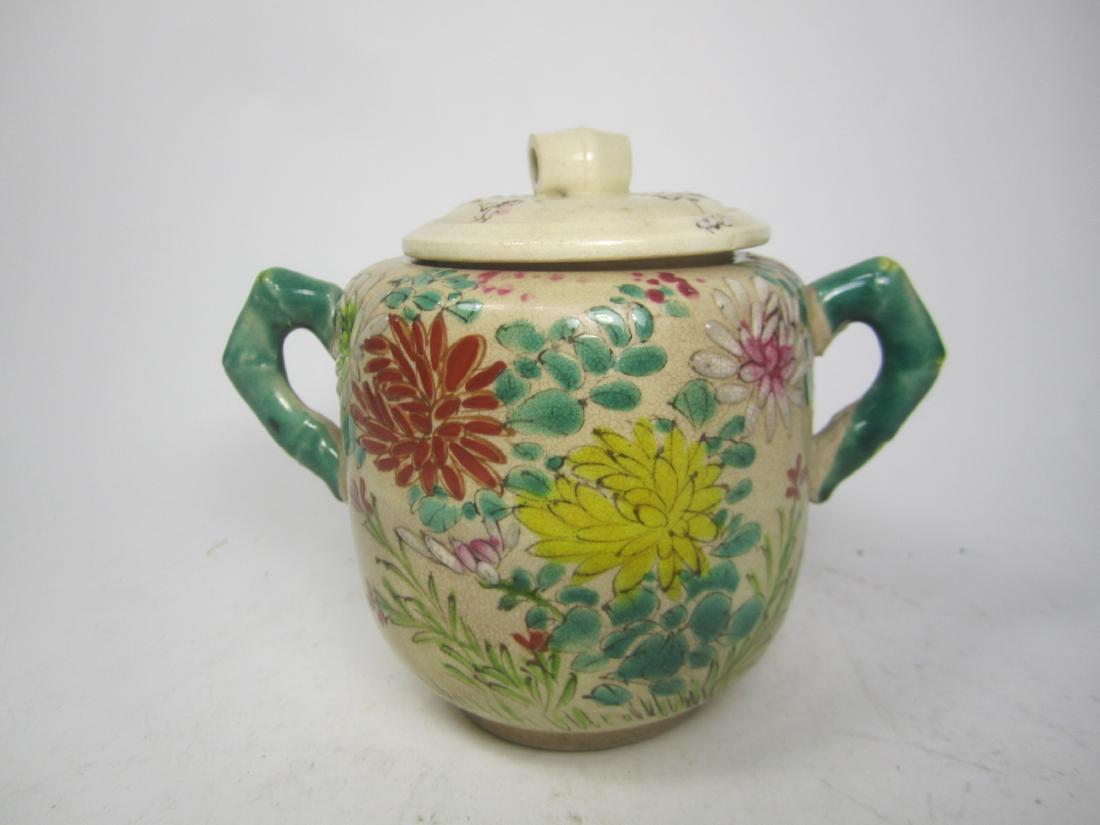 JAPANESE SUTSUMA PORCELAIN SUGER: Meiji period. The lid with large chip and hairlines. 4"H X 5"L X 3.25"W.
