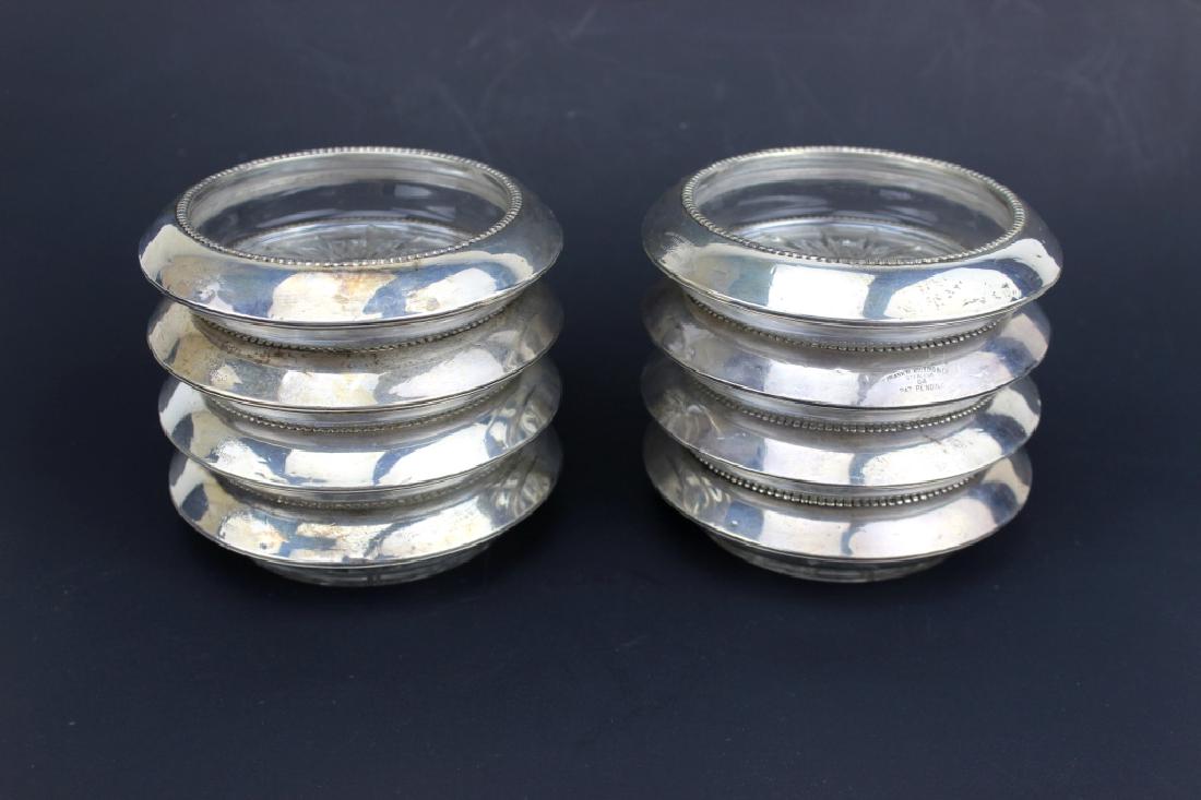 8 FRANK M. WHITING & CO. STERLING GLASS COASTERS: Each coaster measures 4"D X 1" H. In good condition