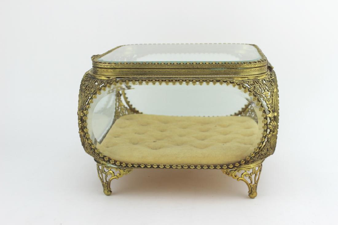ANTIQUE GILT GLASS JEWELRY CASKET: 5" H X 6.75" L X 6.75" W. Age appropriate wear.