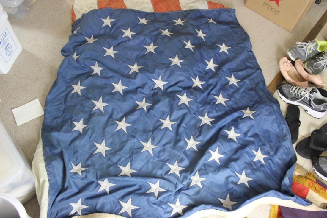 LARGE AMERICA FLAG: 8 in. X12 in.. Torn.