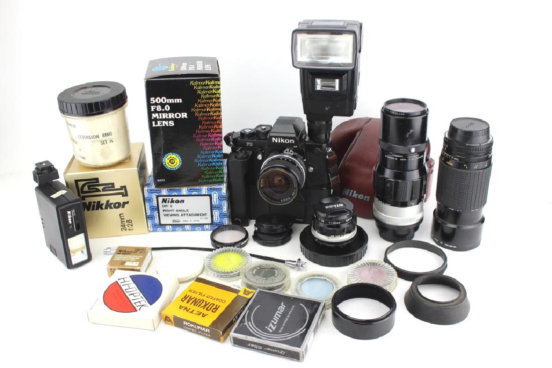NIKON F3 CAMERA AND ACCESSORIES SET: Including a Nikon F3 camera, a Nikon MD-4 Motor Drive for F3 with MS-3 Battery Holder, a Nikon speedlight SB-16, Nikkor-Q auto 1:4, f=200 mm lens, a Sigma Zoom-delta III multi-coated 1:2.8-3.5 f=75-20