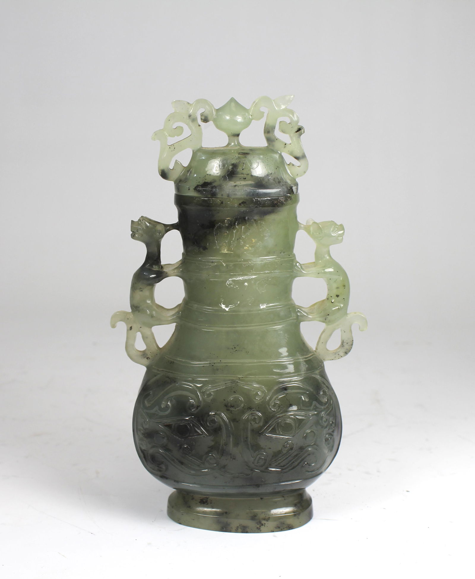 A CHINESE CARVED JADE LIDDED VASE (1 of 10)