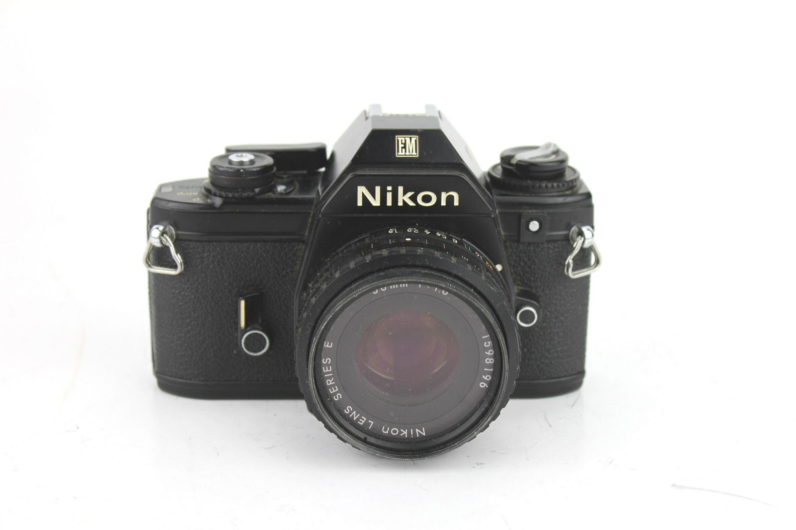 NIKON EM 35MM SLR CAMERA: 1979. 35mm SLR camera. ALL CAMERAS HAVE NOT BEEN TESTED AND ARE BEING SOLD AS-IS.