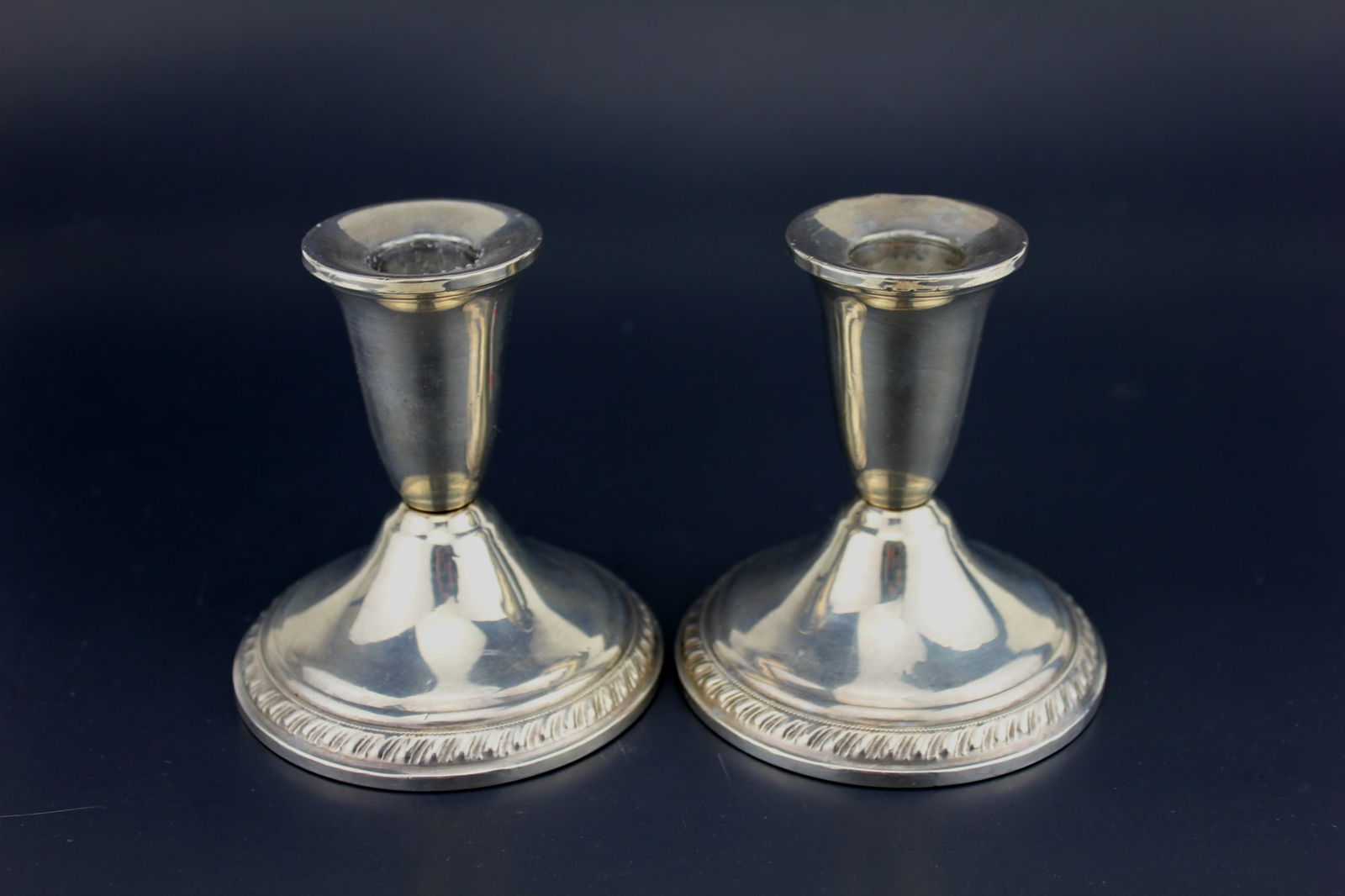 PAIR OF WEIGHTED STERLING CANDLESTICK HOLDERS (1 of 4)