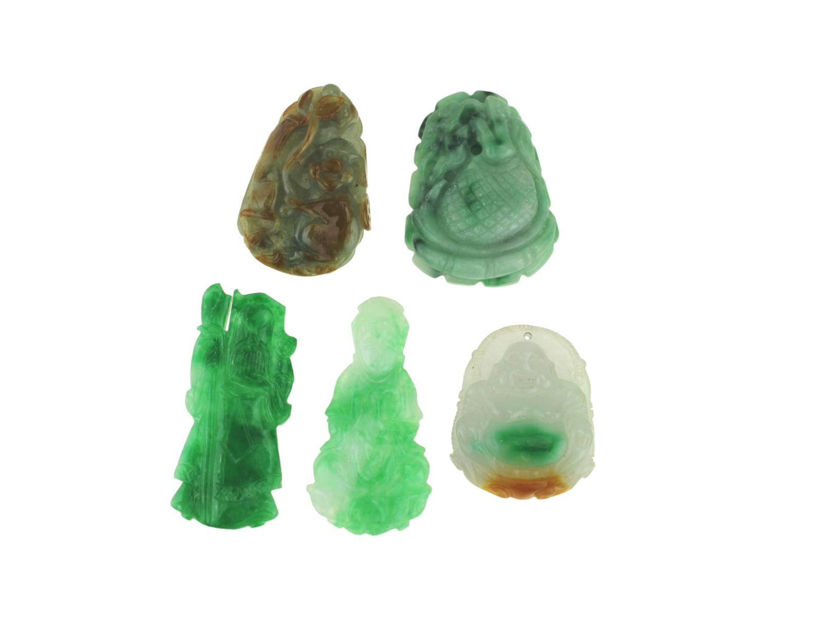 FIVE JADEITE CARVED PENDANTS: The largest one measures approx. 2 3/4 in in length. Please see pictures for detailed conditions.