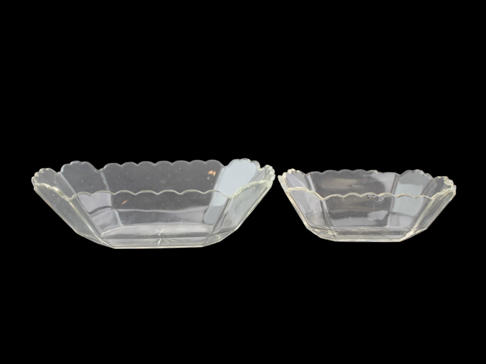Two 19th Glass Bowls: Dimensions: 6 X 4 X 2 in., and 8 X 5 X 2 1/2 in.. respectively. Small chips on rim.