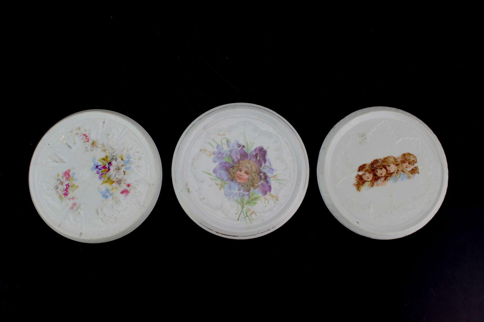 Three Porcelain Teapot Trivets: Dimensions: Approx. 6 1/2 in. (D).