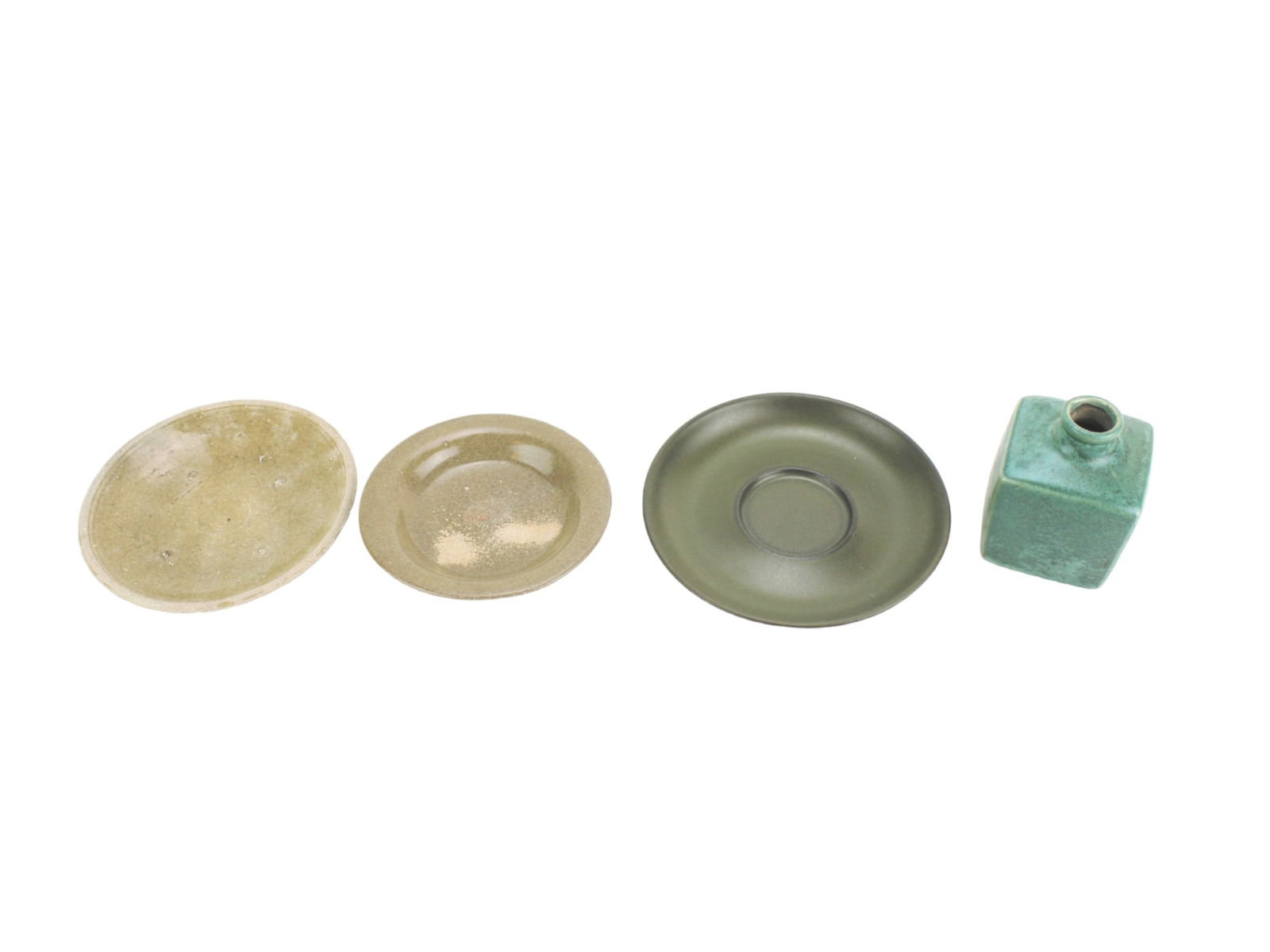 FOUR CELADON ITEMS: Including three dishes and one square vase. The largest one measures Approx. 5 3/4 in.. Please see pictures for detailed conditions.
