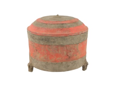 A CHINESE EARTHWARE LIDDED JAR