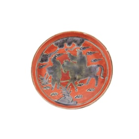 A CHINESE RED GLAZED PORCELAIN DISH