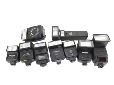 NINE VARIOUS CAMERA FLASHES