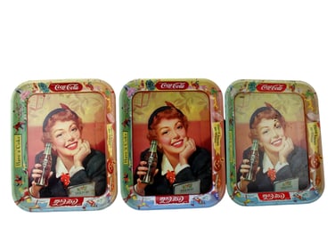 THREE COCA-COLA TIN SERVING TRAYS