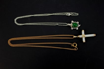 TWO NECKLACES WITH PENDANTS