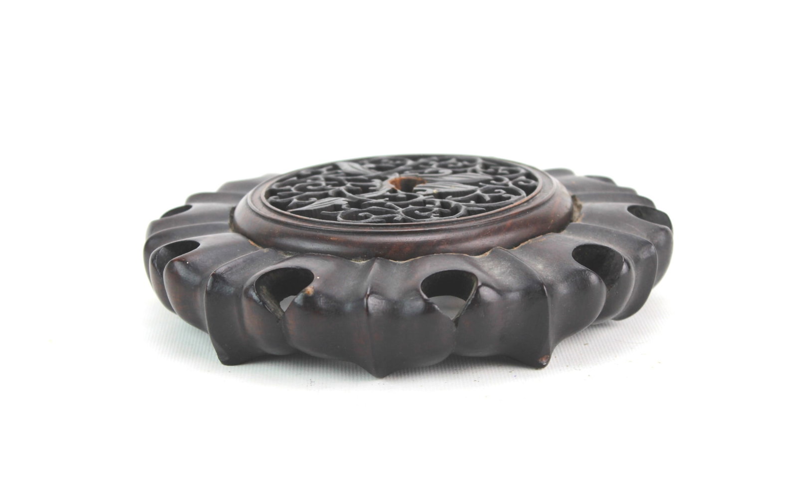 Chinese Craved Wood Stand: Dimensions: 6 1/4 in. (D) X 1 1/2 in. (H). As is.
