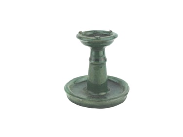 A GREEN GLAZE POTTERY CANDLE HOLDER