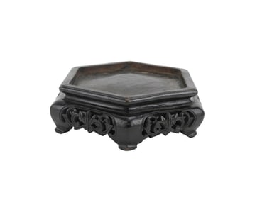A CHINESE HEXAGON CARVED STAND