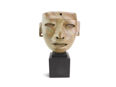 A Carved Stone Aztec Mask