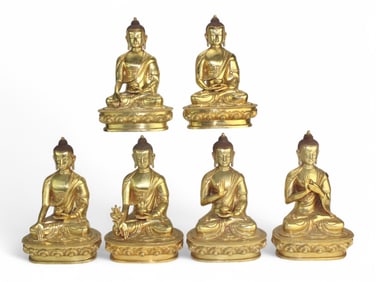 A Group of Six Tibetan Gilt Bronze Buddhas