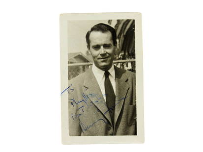 Signed Portrait of Henry Fonda: Signed black-and-white photo of actor Henry Fonda in a suit, featuring a personal inscription to "Phyllis." A classic Hollywood collectible. The photo measures 2 1/2 X 4 in.