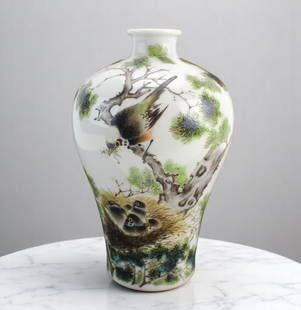 Chinese Famille Rose Mei Ping Vase: A delicately Chinese famille rose porcelain vase featuring a bird feeding its chicks in a nest among pine branches, with calligraphy and artist seals on the reverse in the manor of Liu Yu-Cen, a famou