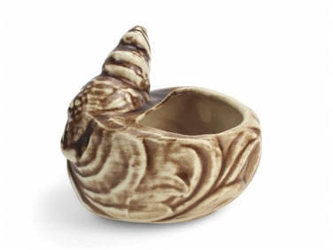 A Shawnee 523 Pottery Parrot on Nest Planter