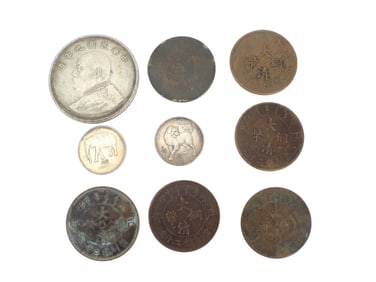 A Group of Nine Various Chinese Coins