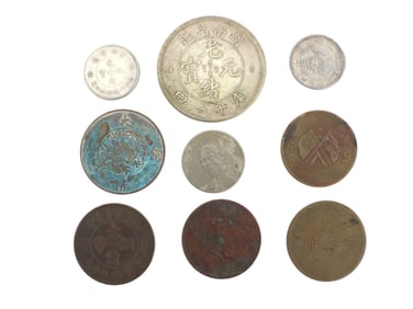 A Group of Nine Various Chinese Coins
