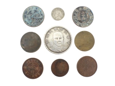 A Group of Nine Assorted Chinese Coins