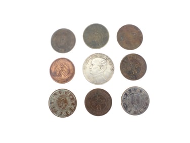 A Group of Nine Assorted Chinese Coins