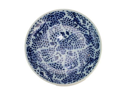 Chinese Blue & White Deep Plate with Floral Design: A finely painted Chinese blue and white porcelain deep plate, decorated with dense chrysanthemum blooms in underglaze cobalt blue. The underside features simple foliate sprays and a classic unglazed f