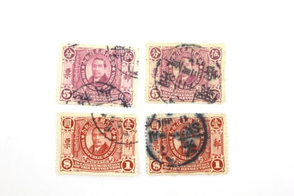 FOUR CHINA USED STAMPS