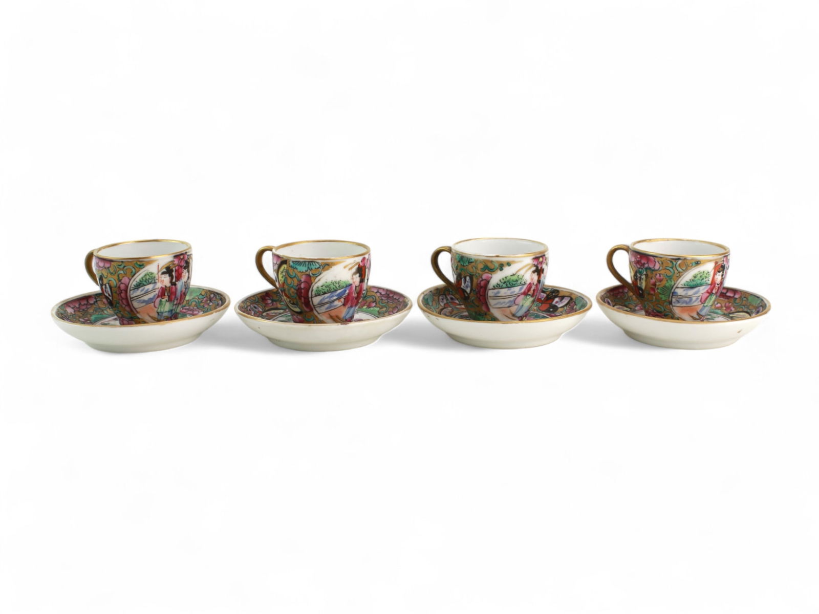 Four Rose Medallion Tea Cups with Saucers: A set of four finely hand-painted Chinese Rose Medallion porcelain tea sets, each consisting of a cup and matching saucer. Decorated with traditional court scenes, birds, butterflies, and floral motif