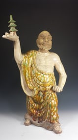 Chinese Sancai-Glazed Luohan Holding a Pagoda