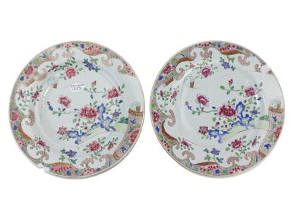 Pair of Chinese Export Famille Rose Plates: A pair of 19th-century Chinese Export porcelain plates, decorated in the Famille Rose palette with vibrant peony flowers, foliage, and traditional scroll motifs. Each plate features colorful overglaze