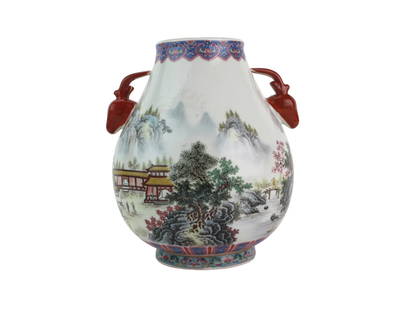Chinese Famille Rose Zun With Deer-head Handles: A 20th Century Chinese famille rose porcelain vase featuring a scenic mountain landscape with pavilions and trees, accented by red deer head handles and colorful decorative borders. The vase includes