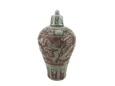 A CHINESE RED UNDERGLAZE LIDDED VASE