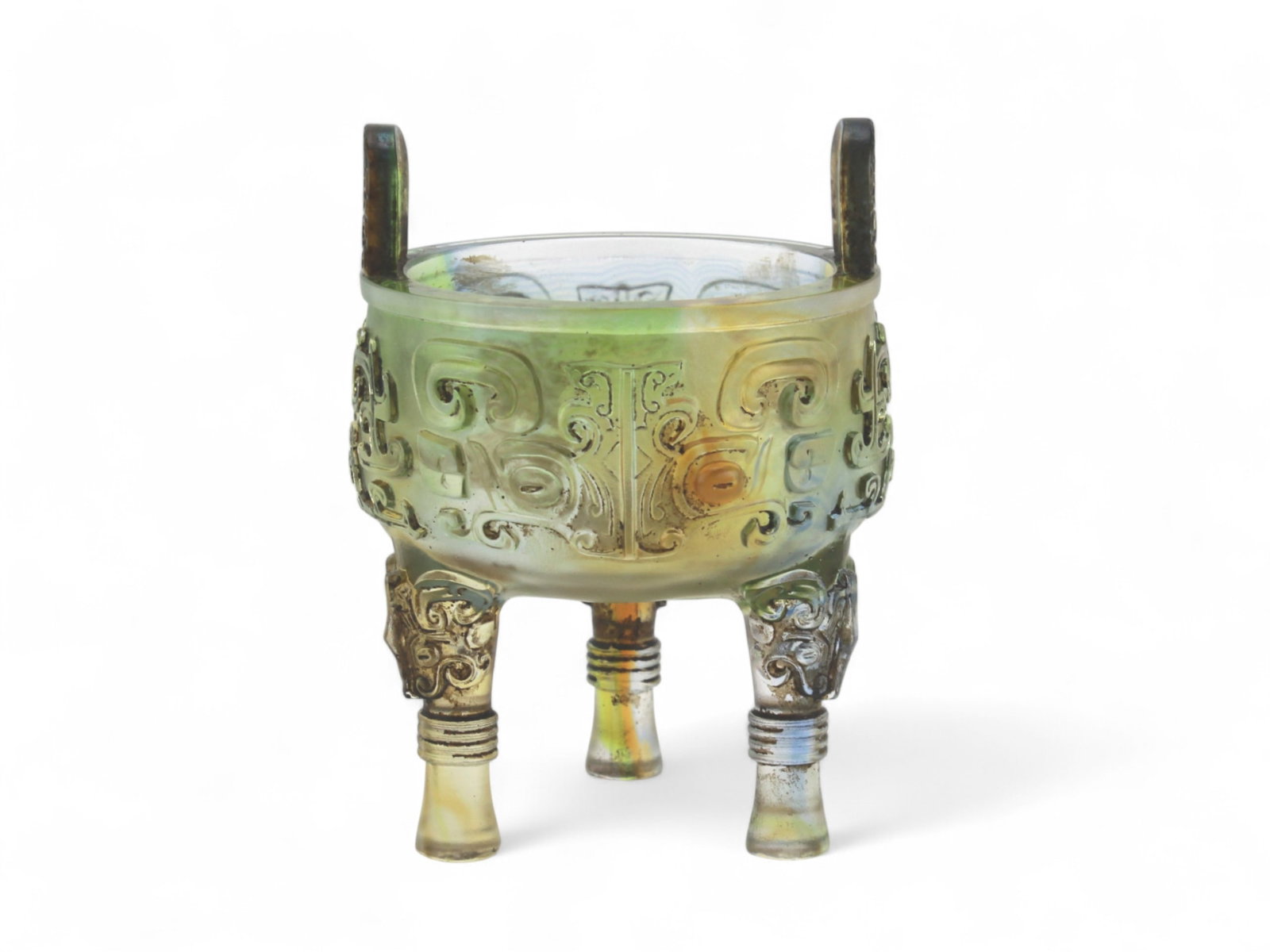 Iridescent Glass Tripod Ding Replica: Glass tripod vessel in iridescent colors with archaic patterns and ornate metal-accented legs, modeled after an ancient Chinese Ding. With a customized case. It measures approximately 5 in. (H) X 3 1/