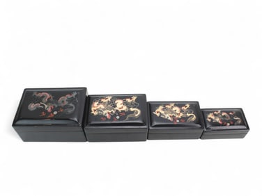 Set of Four Chinese Lacquer Dragon Boxes