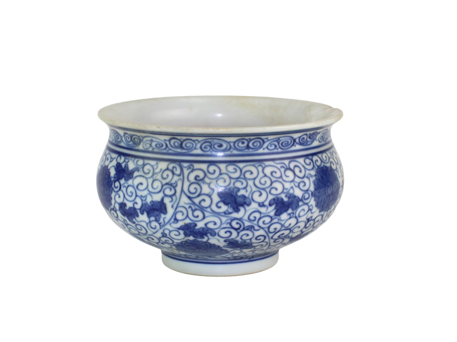 Chinese Blue & White Bowl: A finely painted Chinese blue and white porcelain bowl featuring scrolling lotus patterns. The glaze shows minor age-related discoloration, and there is light surface wear. With chips on rim. Approx 5