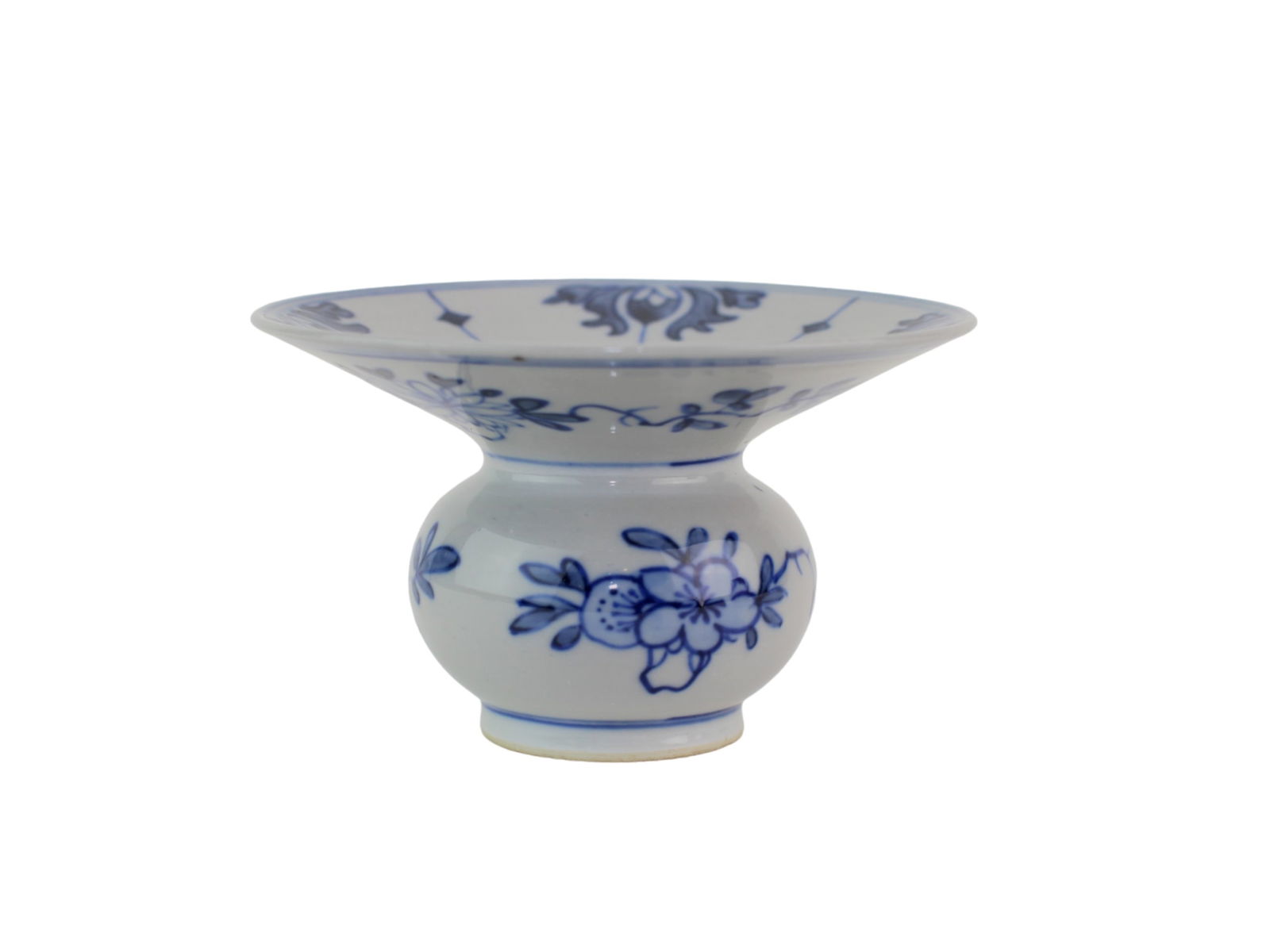 Chinese Blue & White Spittoon: Chinese blue and white porcelain spittoon decorated with floral and foliate motifs, flared rim, and rounded body. Approx. 4 1/2 in. (D) x 2 3/4 in. (H). Minor glaze imperfections; overall in very good